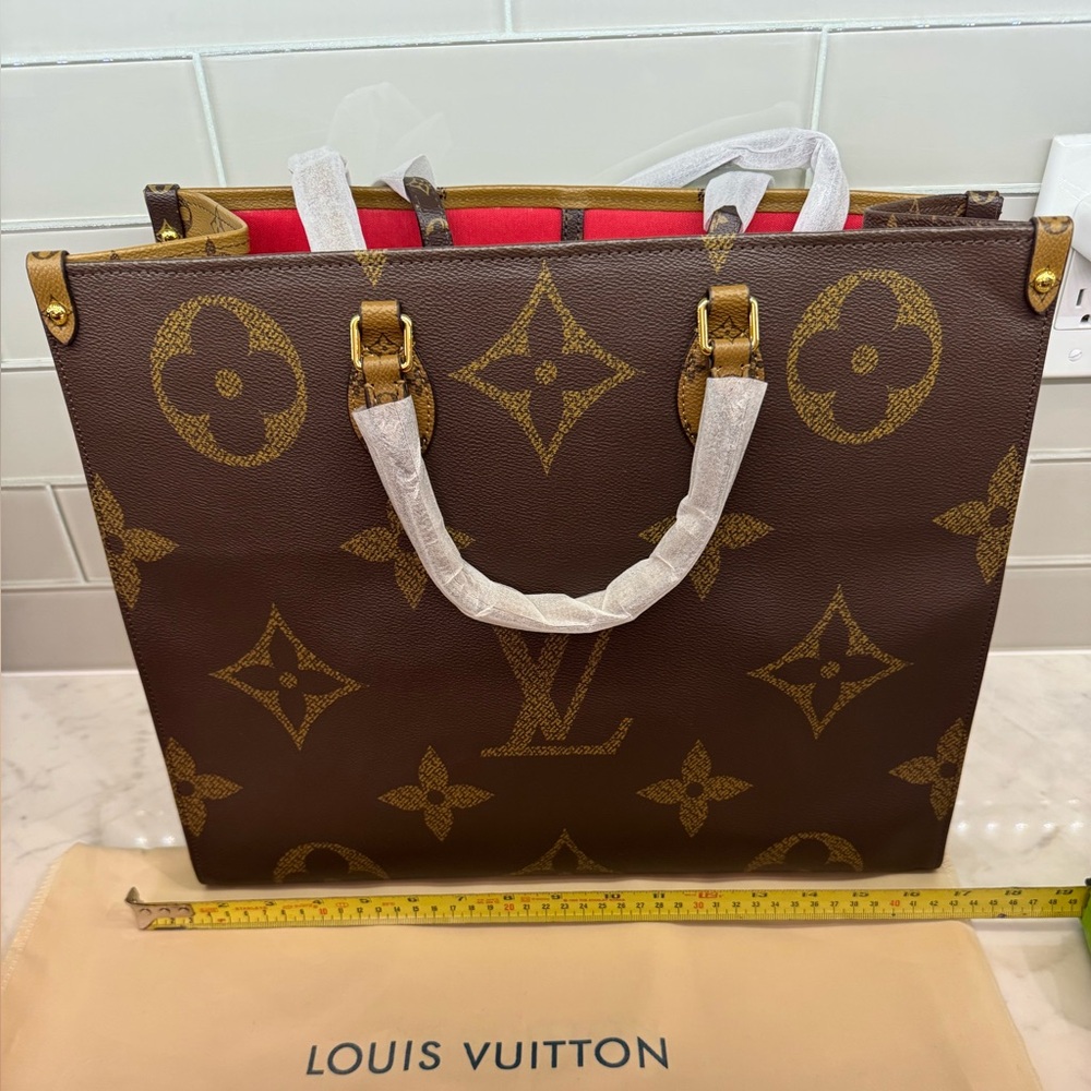 LV GM designer logo Brown and Gold Monogram Tote